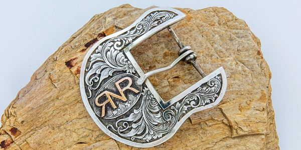 1 1/2" Sterling buckle with sterling fillagree overlay and Gold Brand.  