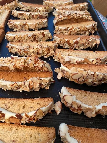 Bakers dozen of our Bella Mamma's favorite Almond biscotti with vanilla and roasted almonds ( we pick the 13th for you to try )