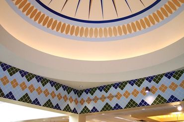 Hand painted dome and lower walls have hand painted tile designs.