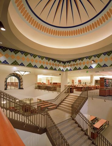 Dome with hand painted designs. Wall tiles are hand painted with metallic paints.