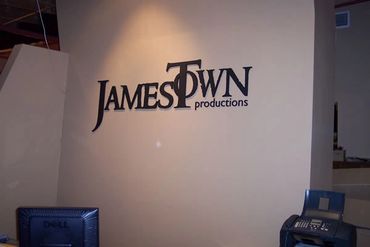 Interior dimensions lobby sign. Wall behind company reception area.