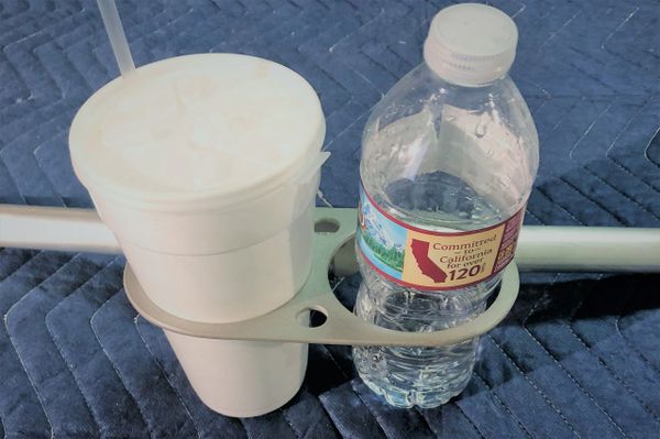 The humble airplane cup holder