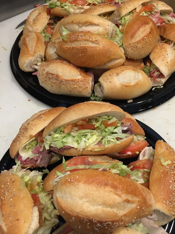 Trays of mini sandwiches for catering event