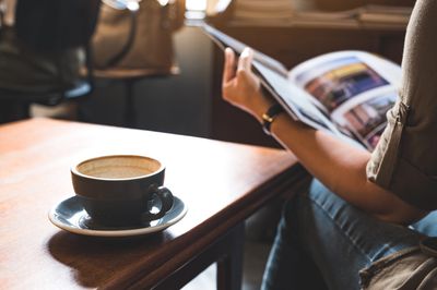 Customer browsing through a home plan book.