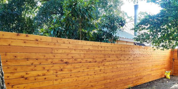Fence stained with sikkens,  fence sealing , austin quality fence staining, oil base stain in Austin