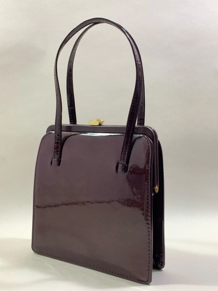 Vintage 1960s Claret Faux Patent Leather Handbag With Brown Fabric Lining
