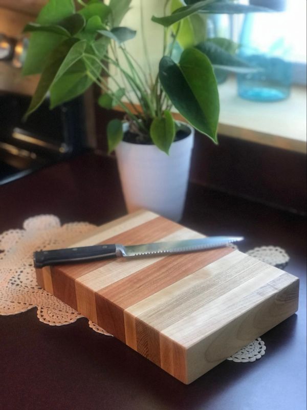 Handcrafted cherry, maple, and ash cutting board. Kitchen home decor.