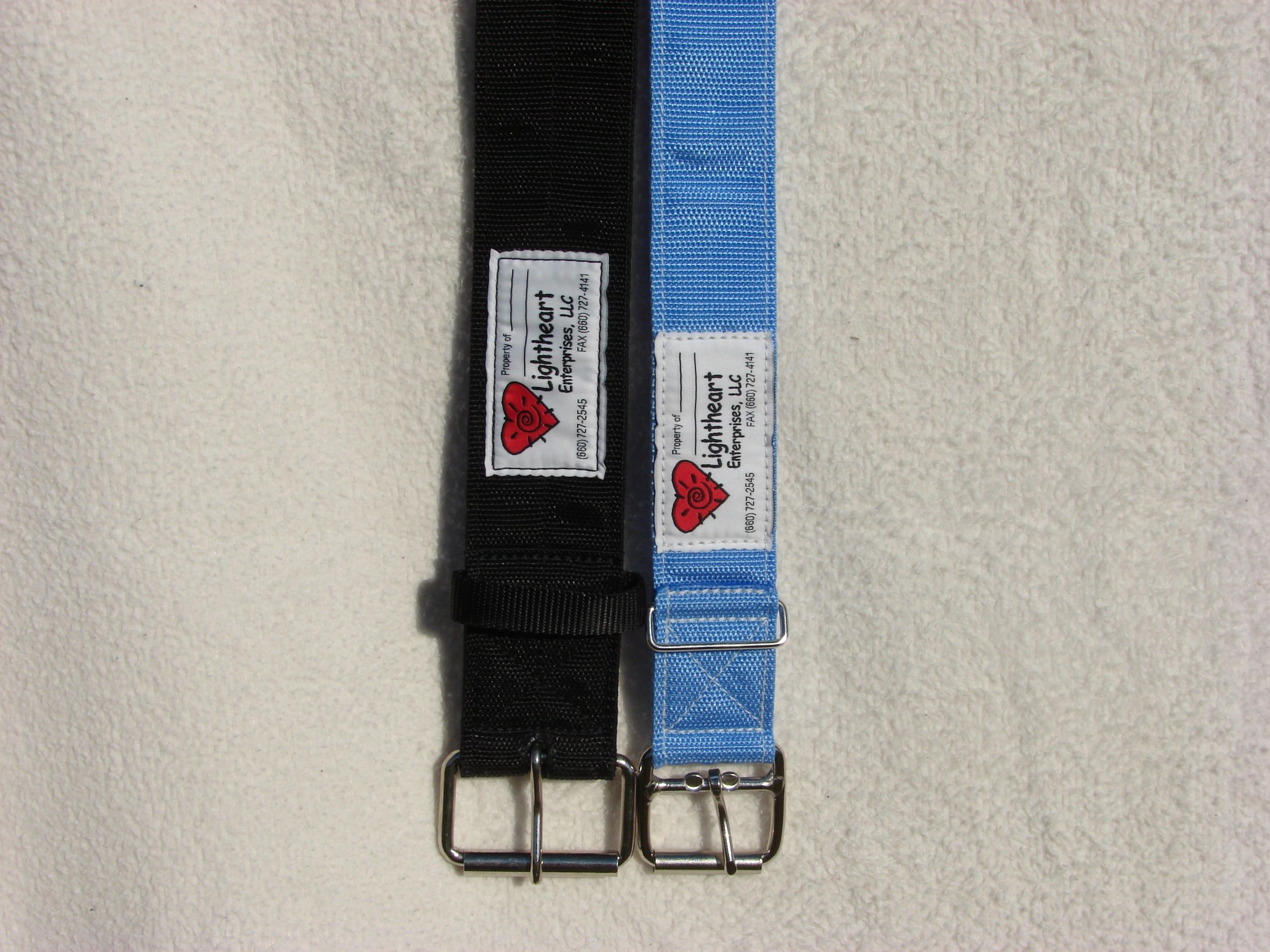 Gait belts with heavy duty buckles and grommets.