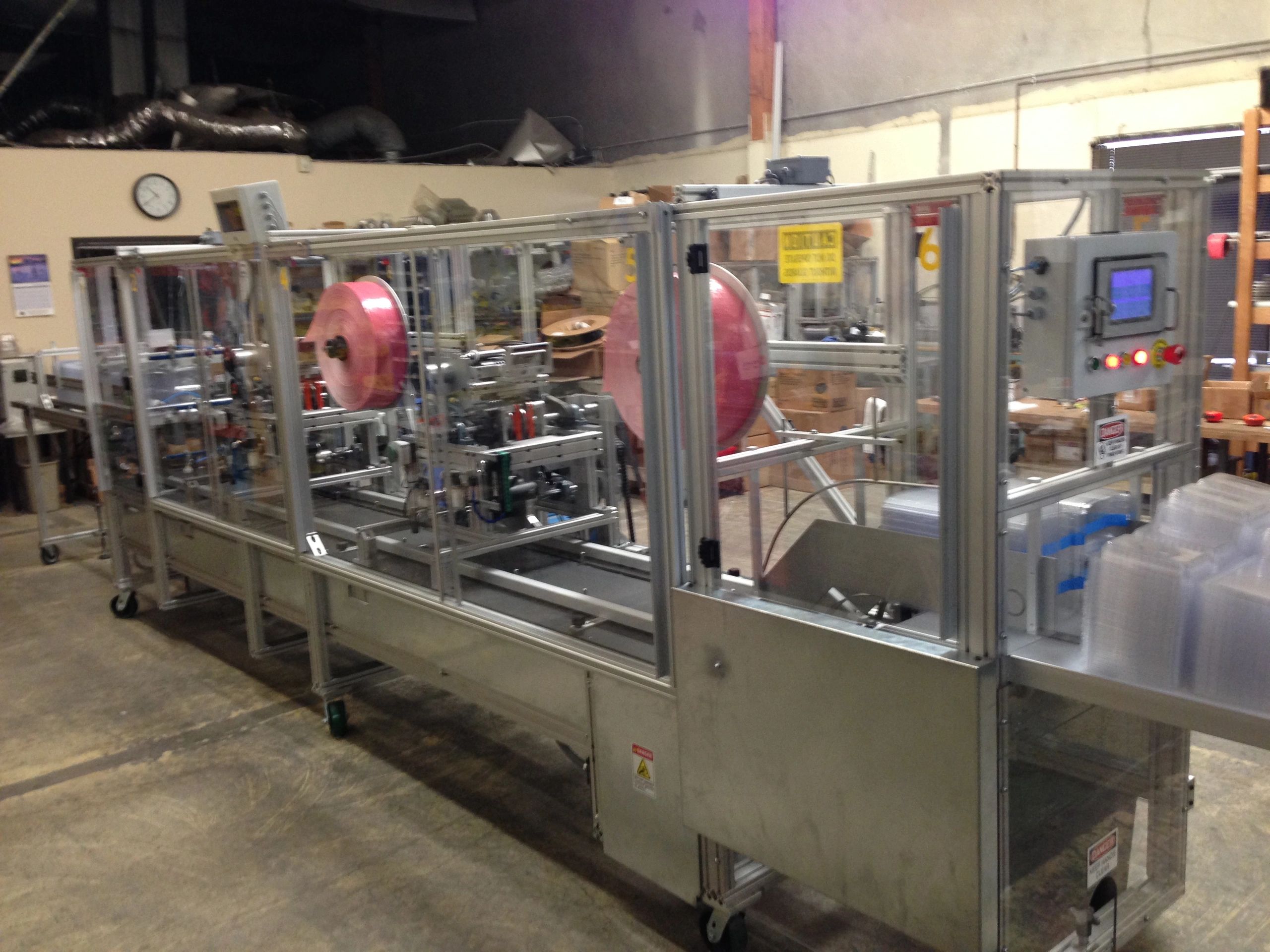 Automated Pad Placement Machine for Clam Shell Containers and Punnets