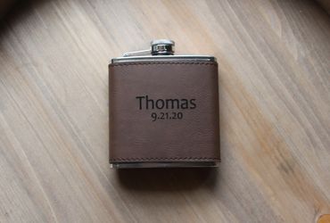 brown leather flask with engraving for groomsmen