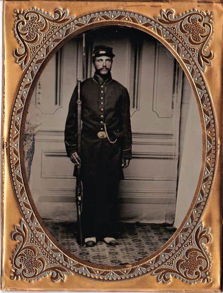 Near Mint Ambrotype of Soldier with Enfield / SOLD