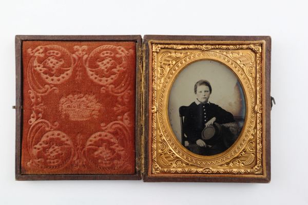 1/6th Plate Ruby Ambrotype of Boy Holding Kepi / SOLD