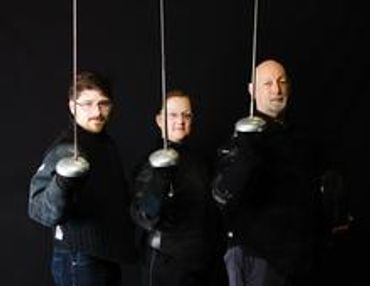 formal picture of fencing coaches