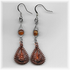 X-tra petite, copper frame, metallic rust/ metallic brown/ brown, with amber bead.