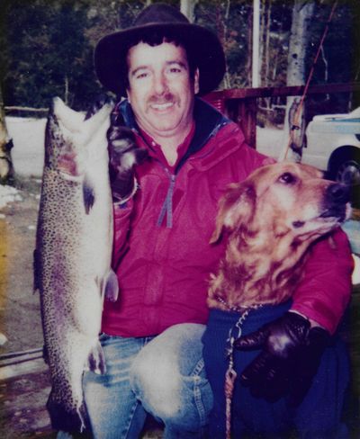 Daisey and Dave with 7 lb. 14 oz  trophy Alpers Trout