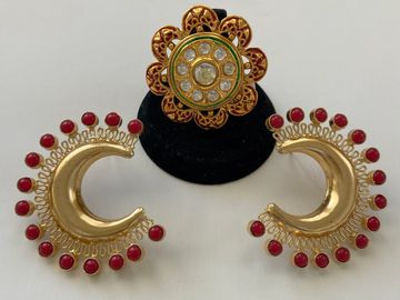 Yellow gold polish with meenakari (enamel) finger ring with earring.
