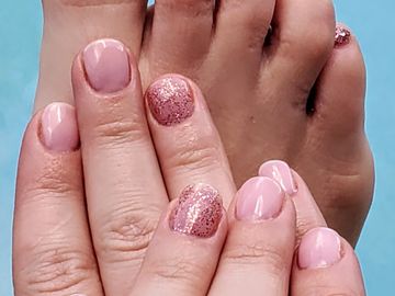 Light pink gel polish toes with light pink sparkle party nail.  Deep darker red sparkling toes compl