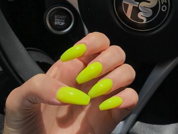 Long bright yellow gel manicure