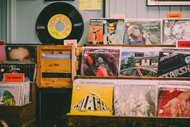 Vinyl records on shelves and walls