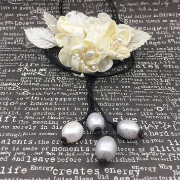 rice pearl lariat necklace over the head black greek leather 