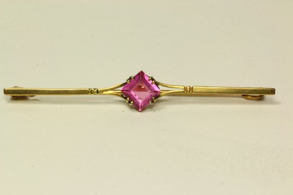 Gold and pink tourmaline stock pin