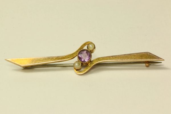 Gold amethyst and seed pearl stock pin