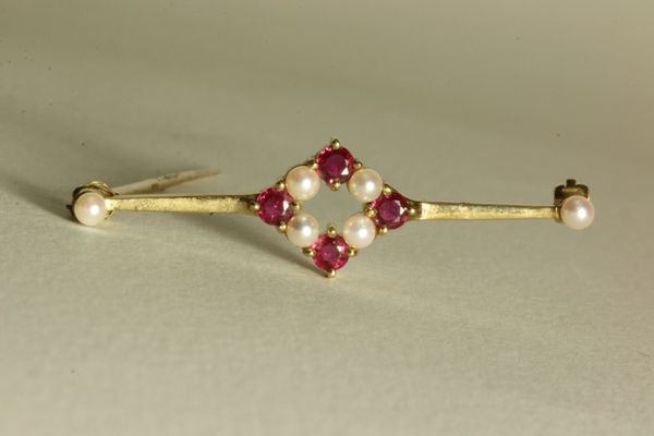 Gold ruby and pearl stock pin