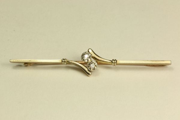 Gold and diamond stock pin