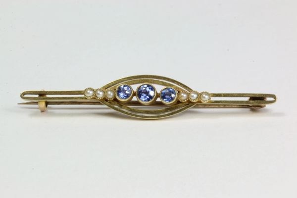 Gold sapphire and pearl stock pin