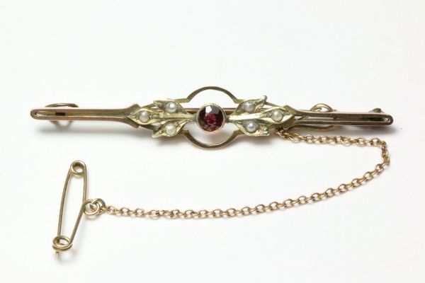 Gold garnet and seed pearl stock pin