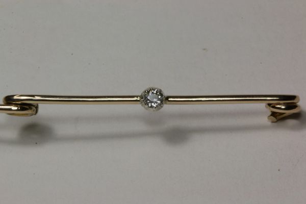 Gold and diamond traditional stock pin
