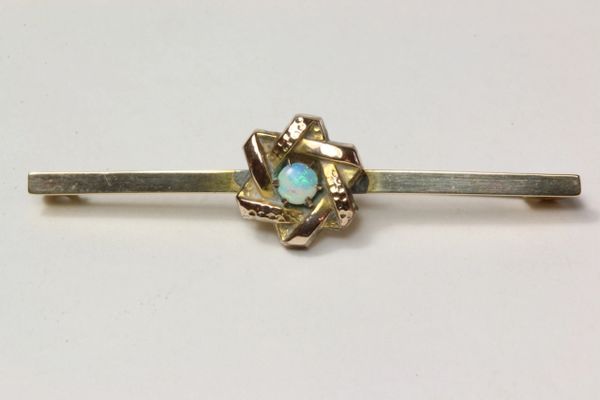 Gold and opal stock pin