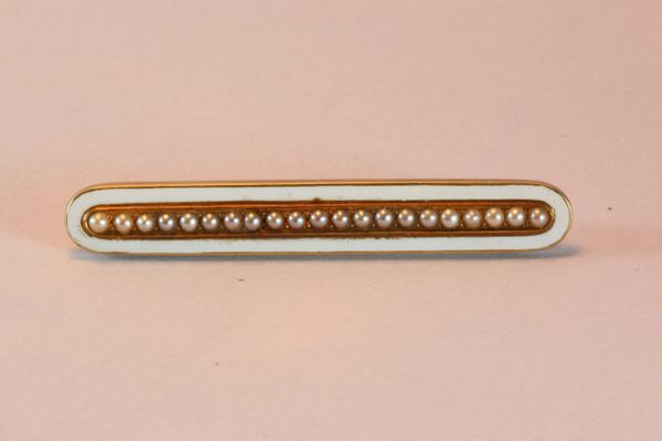 Gold pearl and enamel stock pin