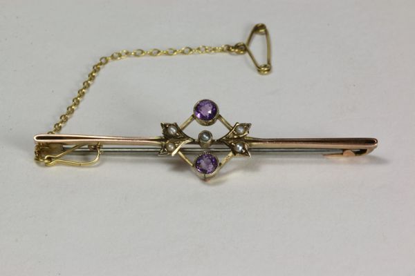 Gold amethyst and seed pearl stock pin