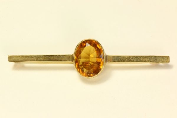 Gold and citrine stock pin