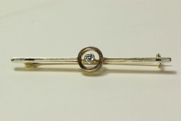 Gold and diamond stock pin