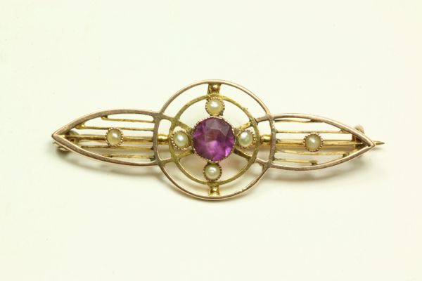 Gold amethyst and seed pearl stock pin