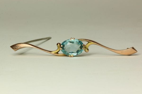 Gold and topaz stock pin