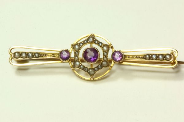 Gold amethyst and seed pearl stock pin