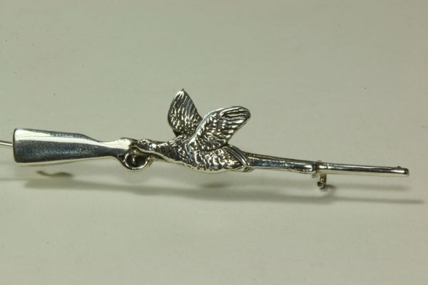 Silver shooting stock pin