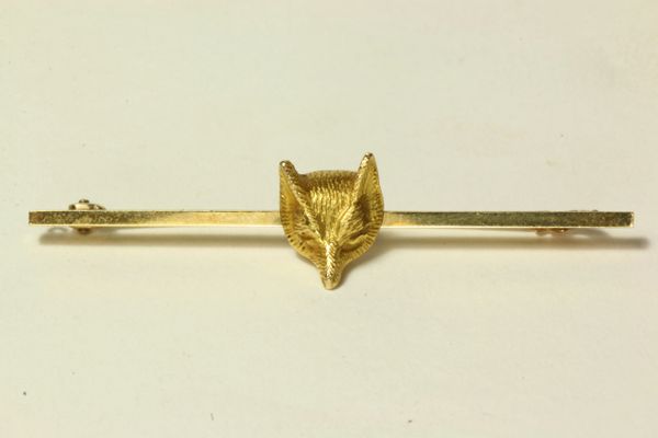 Gold fox head stock pin
