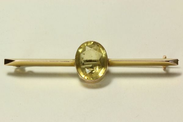 Gold and citrine stock pin