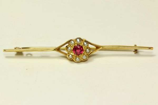 Gold ruby and seed pearl stock pin