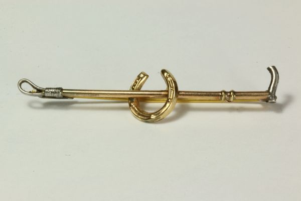 Gold and silver hunting whip stock pin