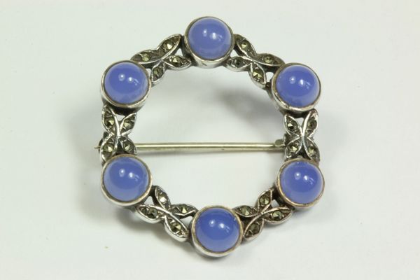 Silver marcasite and chalcedony stock pin