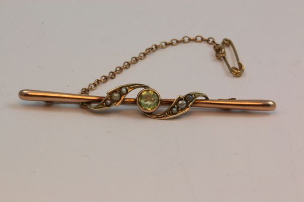 Gold peridot and seed pearl stock pin