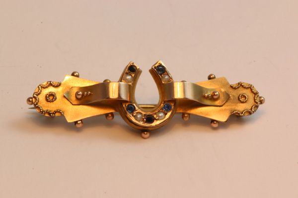 Gold sapphire and pearl stock pin