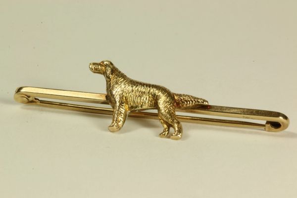 Gold dog stock pin