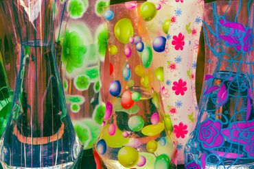 "Vases." A colorful series of flower vases at a street market in Paris.