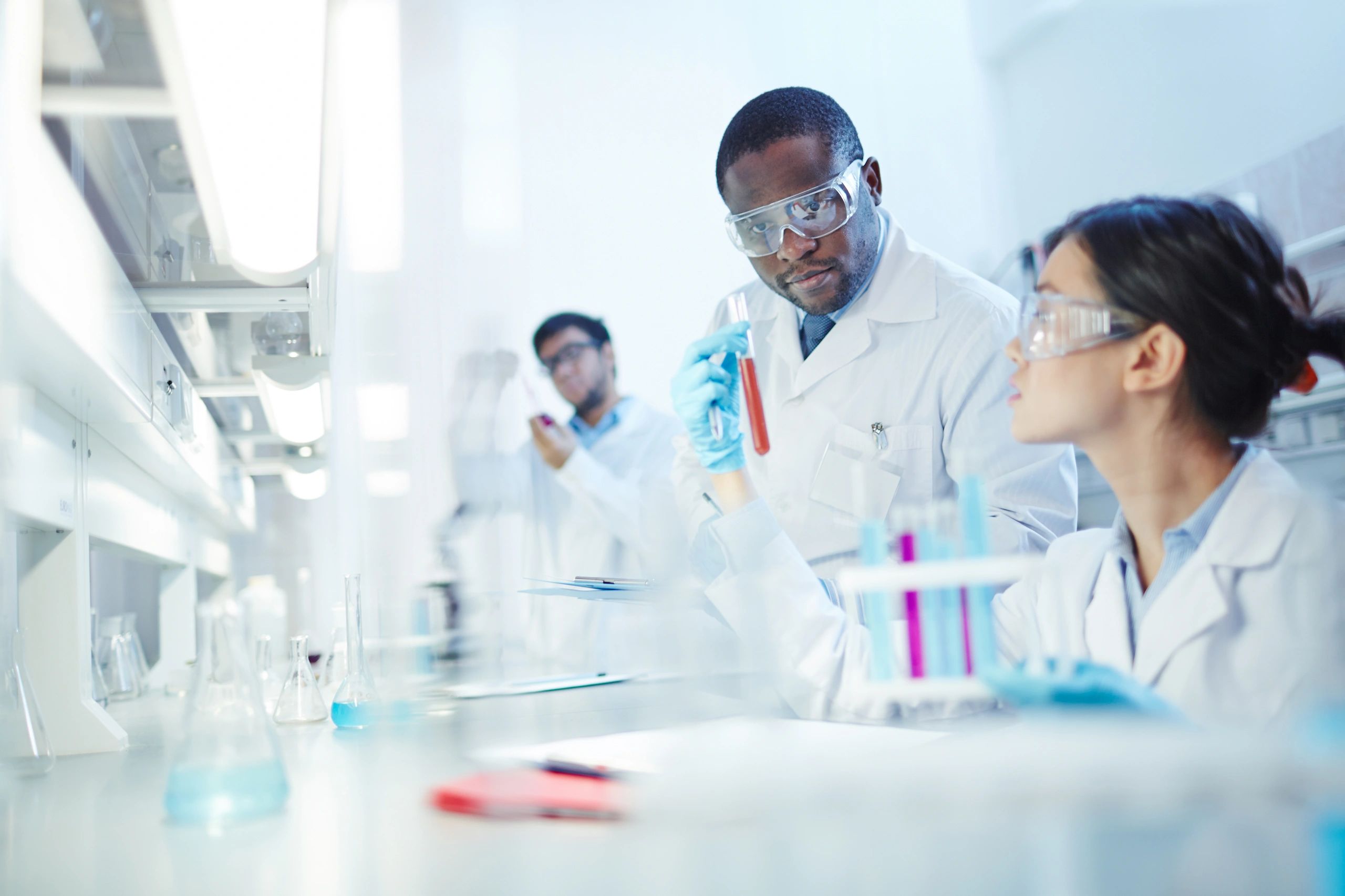 Scientists working in a biotech lab